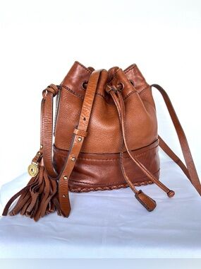 ISABELLA FLORES Cognac Pebble Leather Drawstring Charm Bucket Sml Crossbody Bag